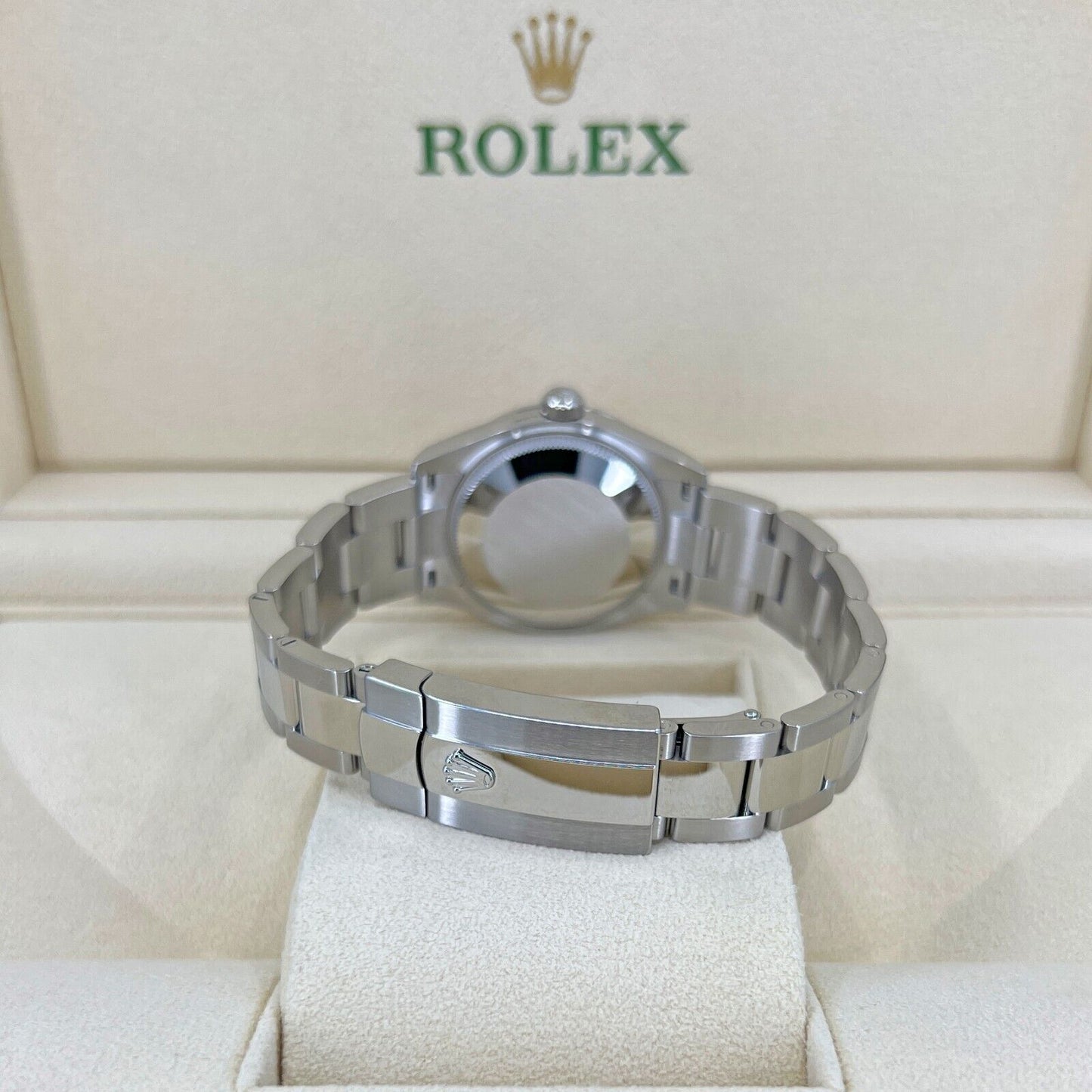 Rolex Datejust 31, Oystersteel and 18k White Gold with Diamonds, Pink Roman dial, 31mm, Fluted, Oyster, Ref# 278274-0023, Back