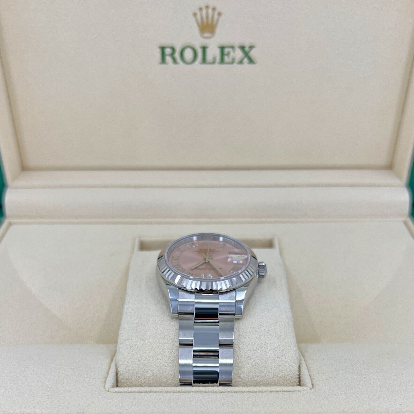 Rolex Datejust 31, Oystersteel and 18k White Gold with Diamonds, Pink Roman dial, 31mm, Fluted, Oyster, Ref# 278274-0023, Side 1