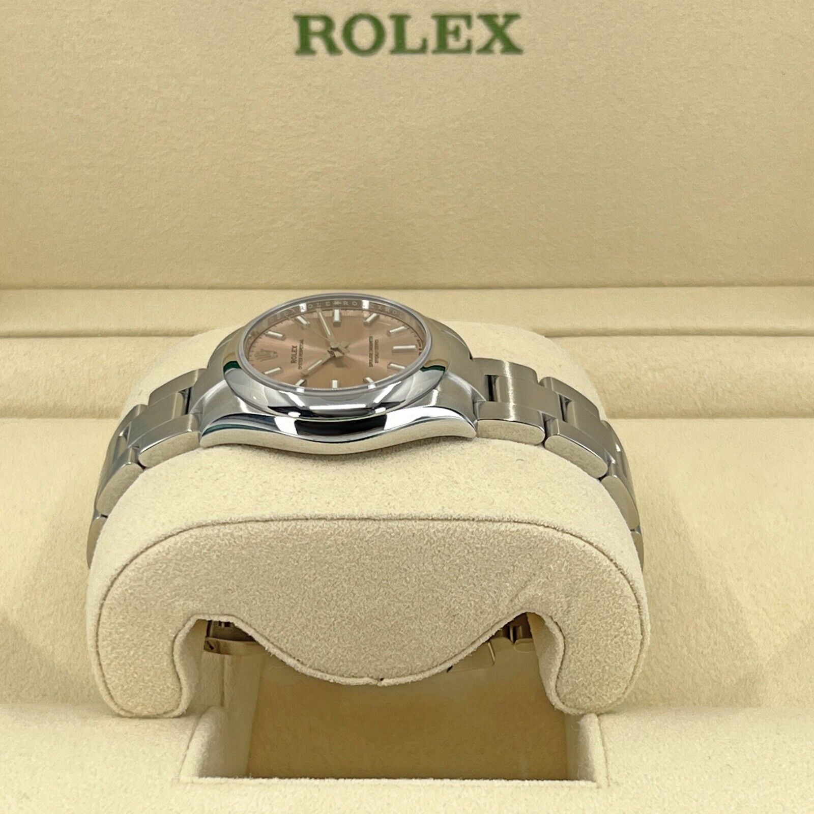 Rolex Oyster Perpetual, Oystersteel, Pink dial, 31mm, Ref# 277200-0004, Left