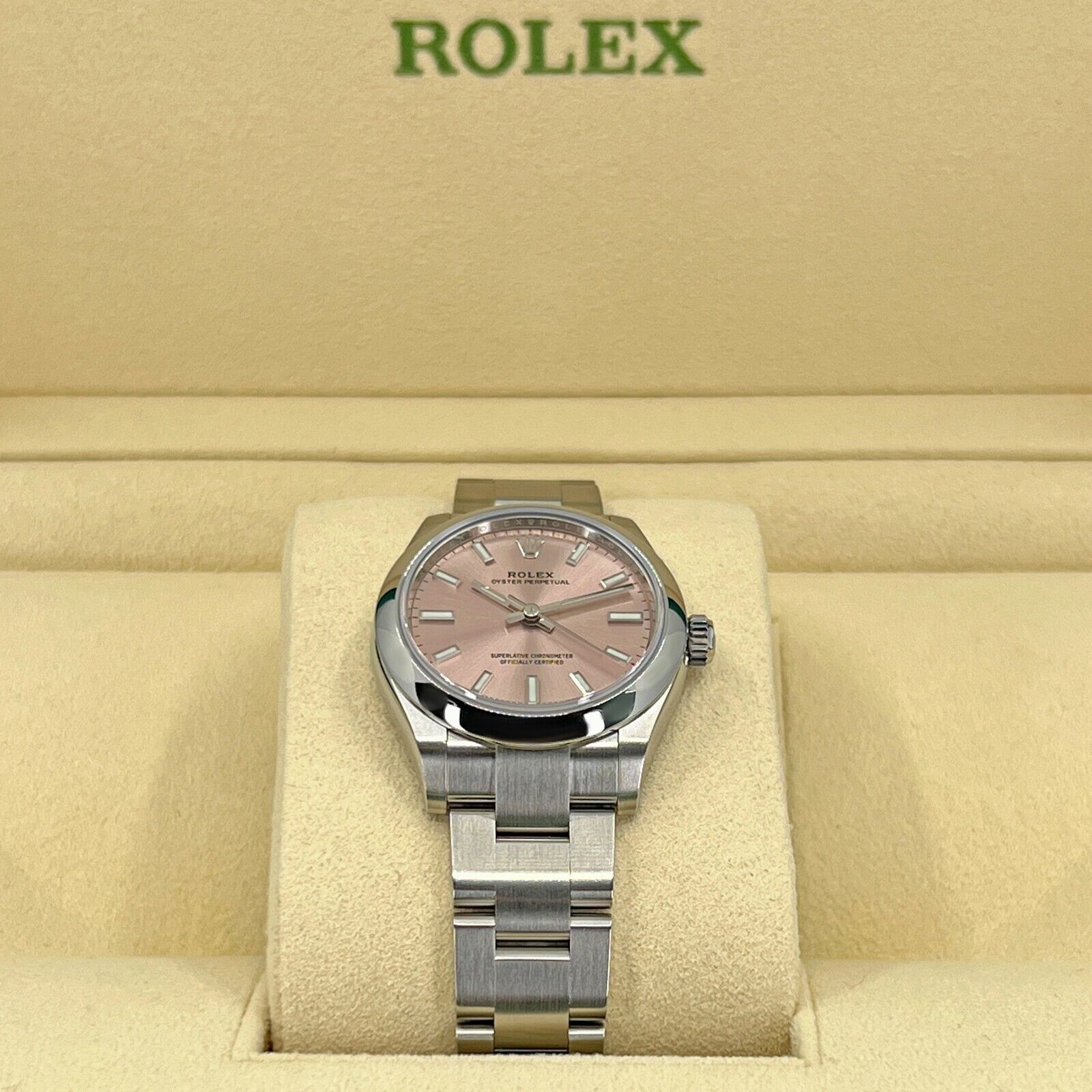 Rolex Oyster Perpetual, Oystersteel, Pink dial, 31mm, Ref# 277200-0004, Side 1