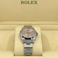 Rolex Oyster Perpetual, Oystersteel, Pink dial, 31mm, Ref# 277200-0004, Side 1