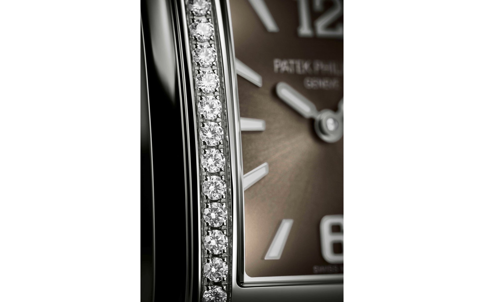 Patek Philippe Twenty~4 Quartz Ladies Watch, Stainless Steel with 36 Diamond (~0.42 ct), 25.1 x 30 mm, Ref# 4910/1200A-010, Bezel