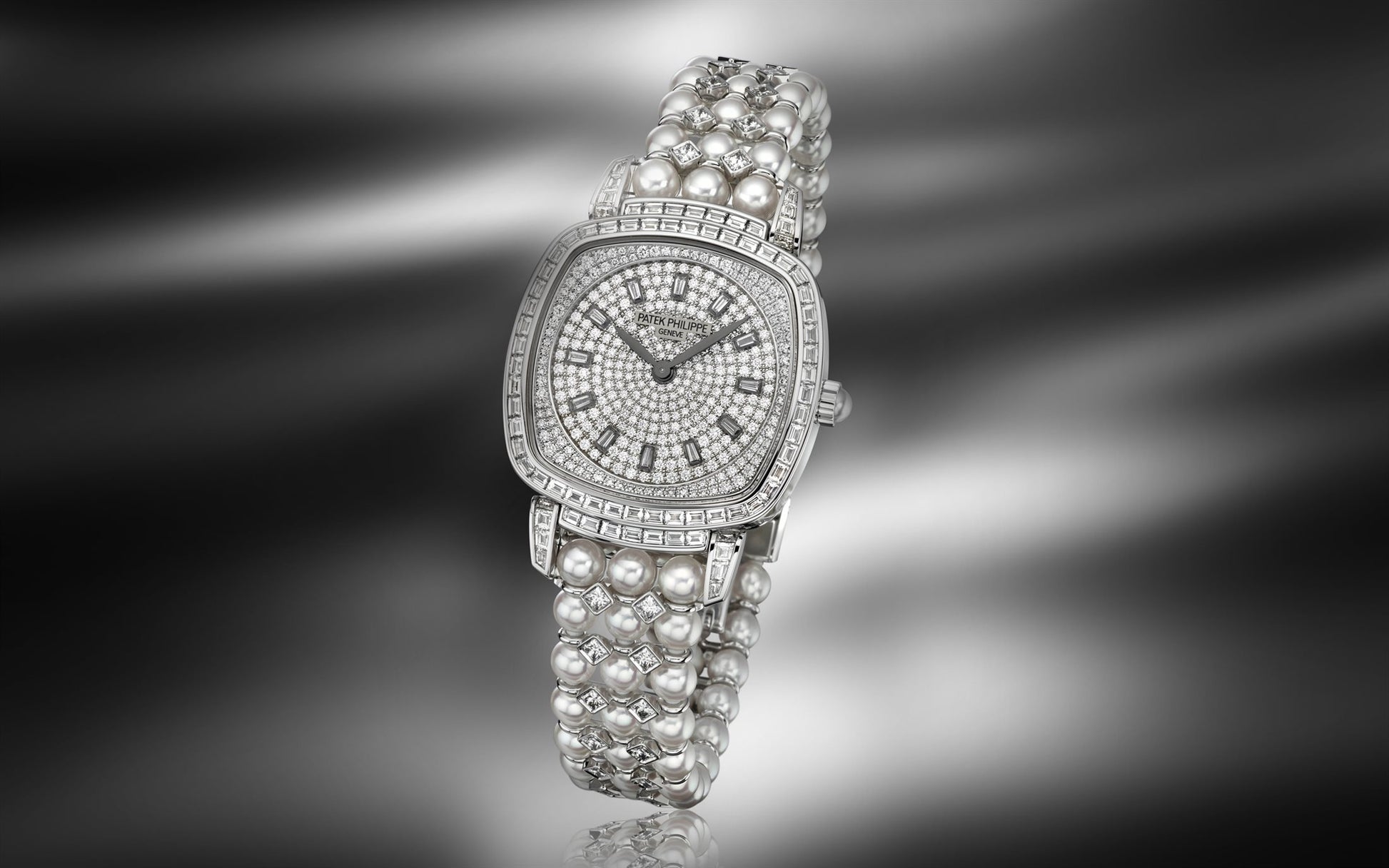 Patek Philippe Ladies Gondolo Haute Joaillerie, 18kt White Gold set with diamonds and Akoya pearls, 31 × 34.8mm, Ref# 7042/100G-010, Main view