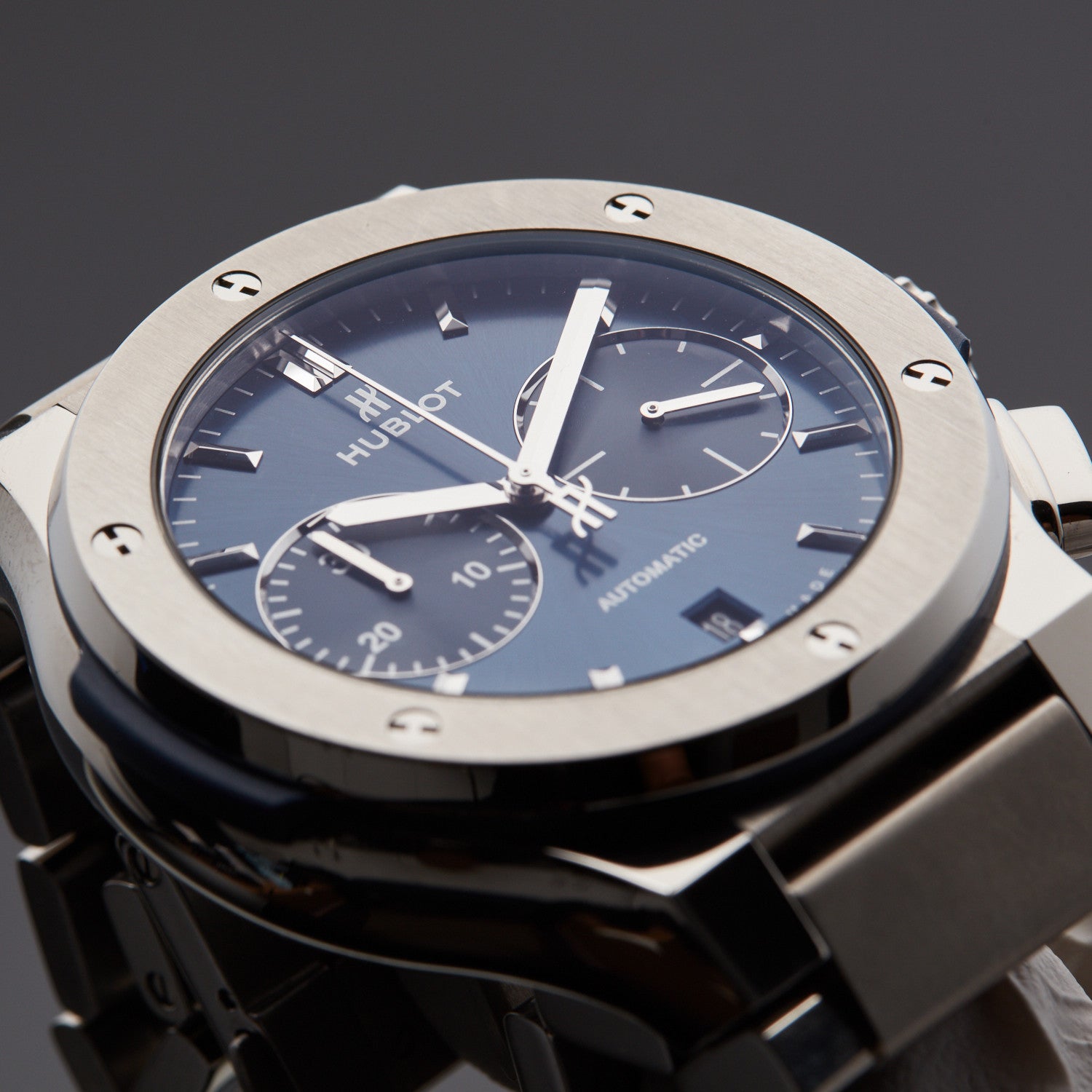 Hublot Classic Fusion Blue Chronograph Titanium Bracelet 45mm, Ref# 520.NX.7170.NX, Bezel